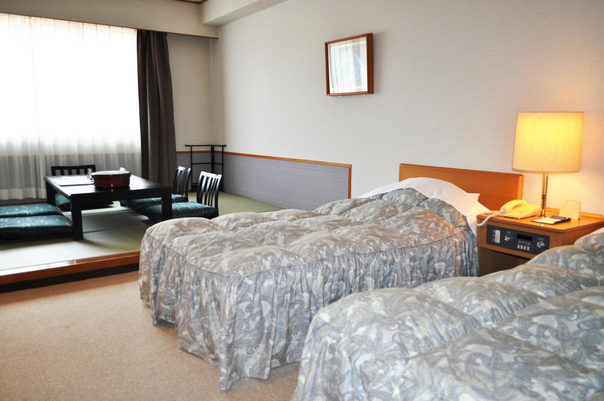 Tateyama Kokusai Hotel Toyama Station Habitación foto